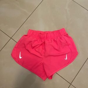 Women’s neon pink running shorts